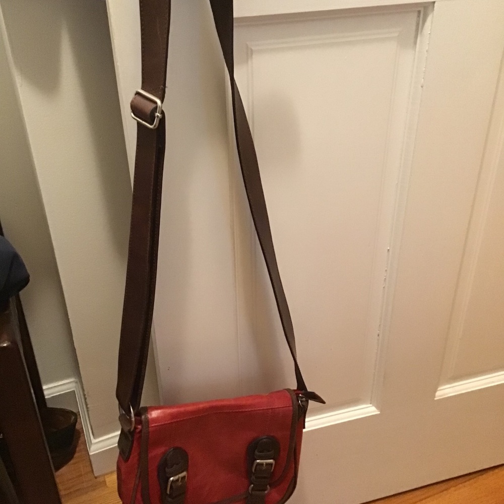 Tano Red leather bag with long strap that could be crossbody bag